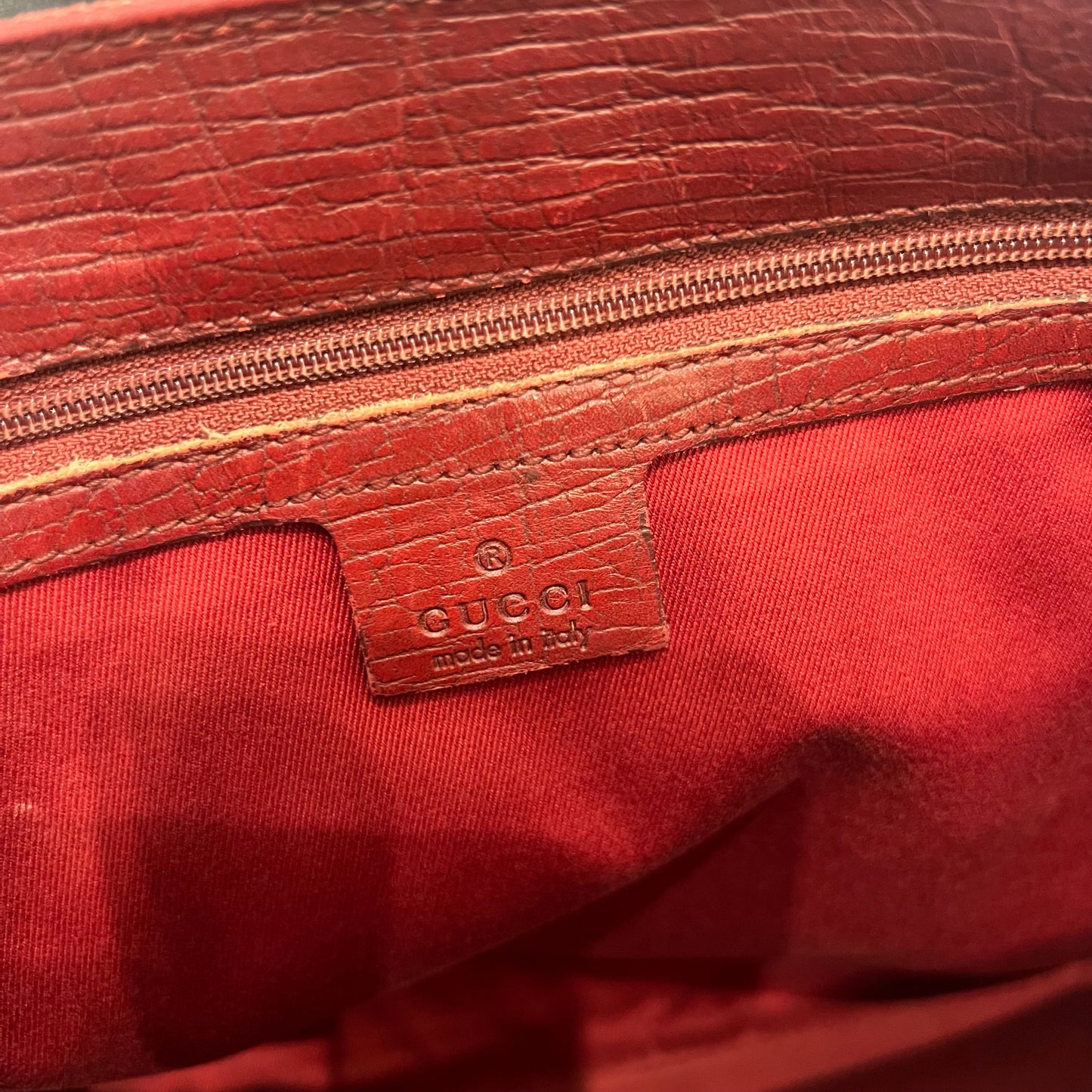 Gucci red monogram bag with bamboo details