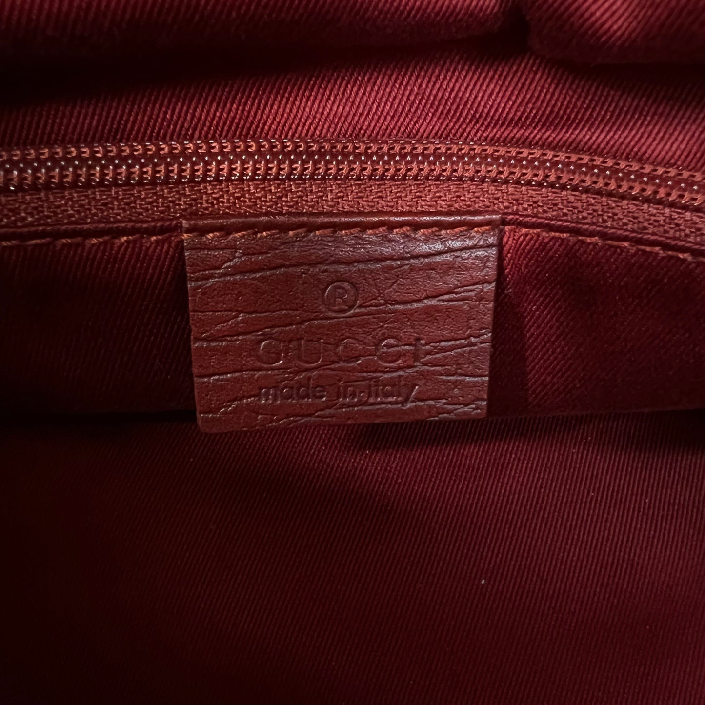 Gucci red monogram bag